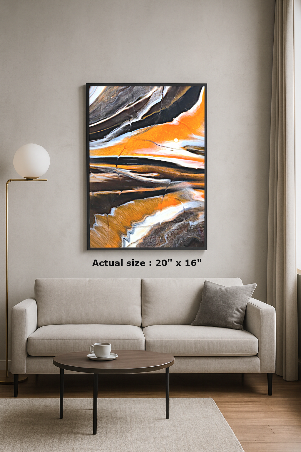 Abstract epoxy resin wall art with orange, black, and white swirls in a modern black frame