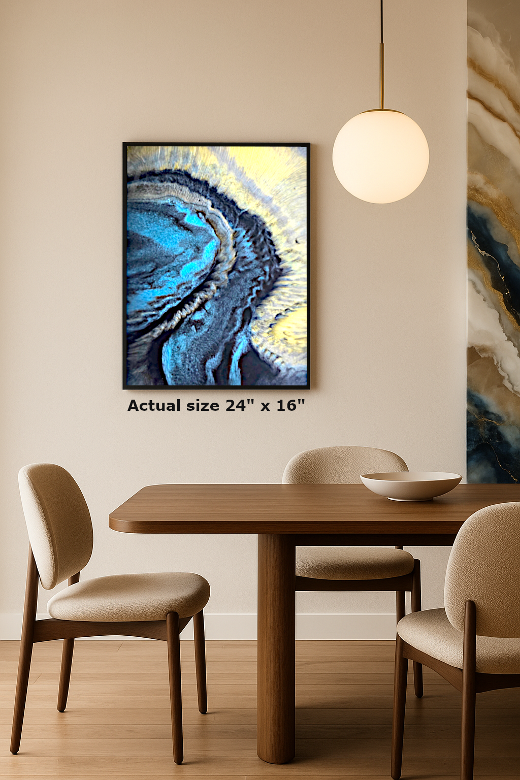 Abstract epoxy resin wall art featuring fluid gold, blue, and black textures in a modern frame